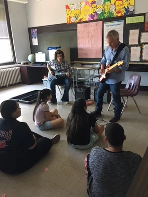Music lesson performance in a school classroom